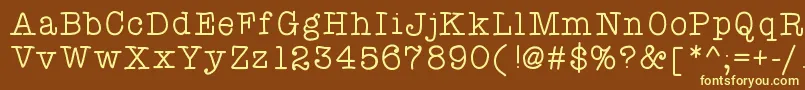 Atypewriterforme-fontti – keltaiset fontit ruskealla taustalla