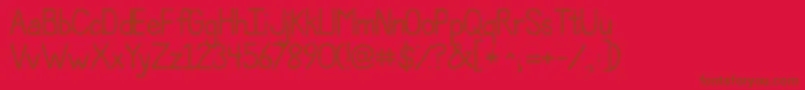 Jandapolkadotpunch Font – Brown Fonts on Red Background