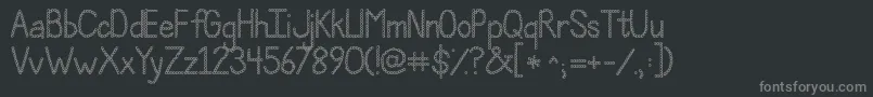 Czcionka Jandapolkadotpunch – szare czcionki na czarnym tle