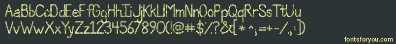 Jandapolkadotpunch Font – Yellow Fonts on Black Background