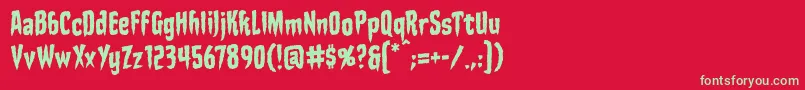 StakethroughtheheartbbReg Font – Green Fonts on Red Background