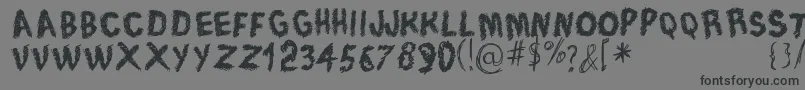 TraceOfRough-Schriftart – Schwarze Schriften auf grauem Hintergrund