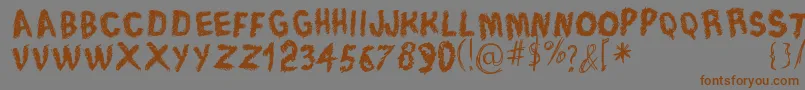 TraceOfRough-Schriftart – Braune Schriften auf grauem Hintergrund