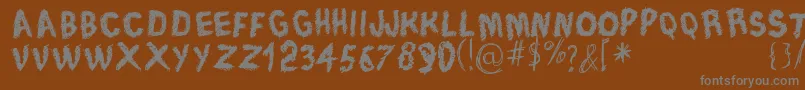 Шрифт TraceOfRough – серые шрифты на коричневом фоне