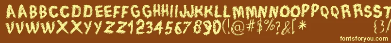 TraceOfRough-Schriftart – Gelbe Schriften auf braunem Hintergrund