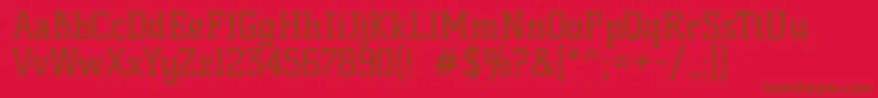 KellyslabRegular-Schriftart – Braune Schriften auf rotem Hintergrund