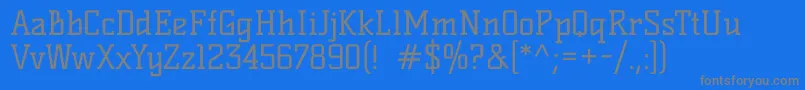 KellyslabRegular-fontti – harmaat kirjasimet sinisellä taustalla