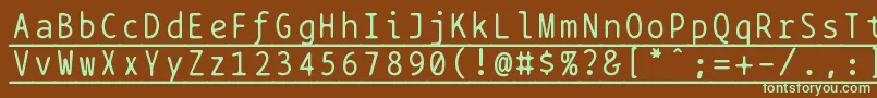 フォントBptypewriteunderscored – 緑色の文字が茶色の背景にあります。