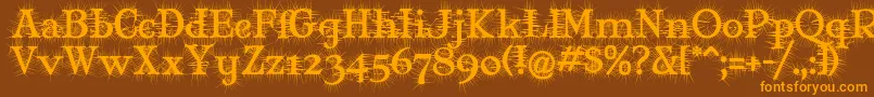 フォントMaryJaneDegroot – オレンジ色の文字が茶色の背景にあります。