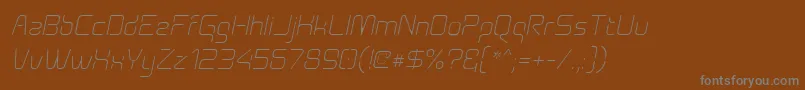 フォントAunchantedthinoblique – 茶色の背景に灰色の文字