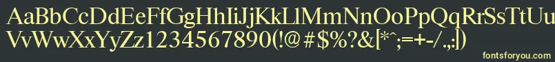 フォントRiccioneserialRegular – 黒い背景に黄色の文字