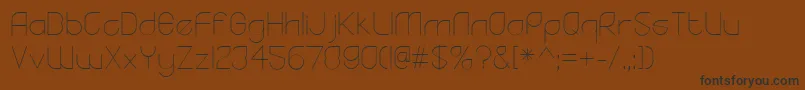 YodoLight Font – Black Fonts on Brown Background