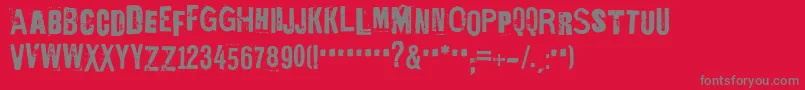 EdGeinYnnocent-fontti – harmaat kirjasimet punaisella taustalla