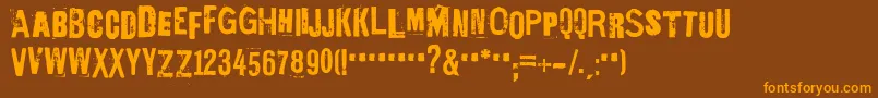 フォントEdGeinYnnocent – オレンジ色の文字が茶色の背景にあります。
