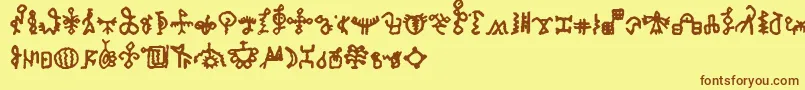 フォントBamumSymbols1 – 茶色の文字が黄色の背景にあります。