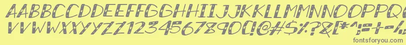Lisätietoja SnowySparklesItalic-fontista SnowySparklesItalic-fontti – harmaat kirjasimet keltaisella taustalla