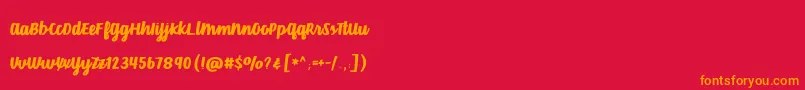 VelvetHeart-Schriftart – Orangefarbene Schriften auf rotem Hintergrund