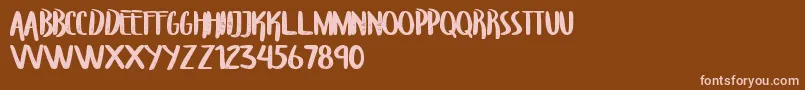 TroupersCapitals Font – Pink Fonts on Brown Background