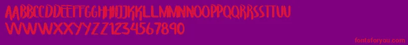 フォントTroupersCapitals – 紫の背景に赤い文字