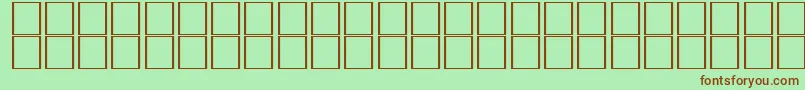 McsTabukSINormal.-fontti – ruskeat fontit vihreällä taustalla