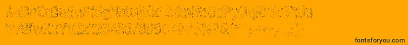 Graffiti4c-Schriftart – Schwarze Schriften auf orangefarbenem Hintergrund