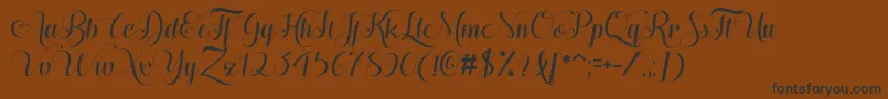 HugsKissesXoxoDemo-Schriftart – Schwarze Schriften auf braunem Hintergrund