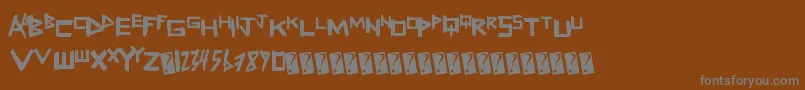 Weitere Informationen zur Freshsticks-Schriftart Freshsticks-Schriftart – Graue Schriften auf braunem Hintergrund