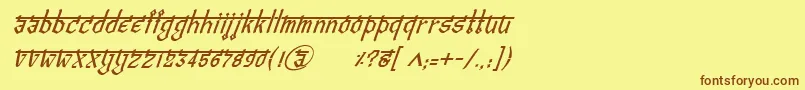 フォントBitlingvedasItalic – 茶色の文字が黄色の背景にあります。