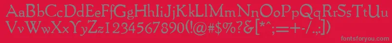 Packardantique-fontti – harmaat kirjasimet punaisella taustalla