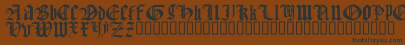 GothicTextureQuadrata-Schriftart – Schwarze Schriften auf braunem Hintergrund