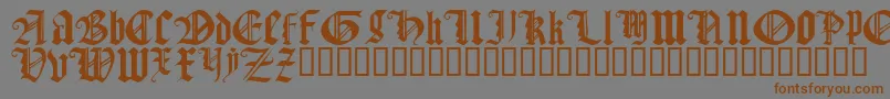 Czcionka GothicTextureQuadrata – brązowe czcionki na szarym tle