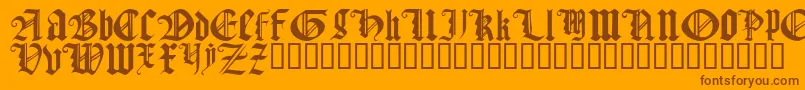 Fonte GothicTextureQuadrata – fontes marrons em um fundo laranja
