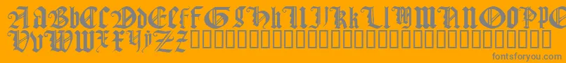 Czcionka GothicTextureQuadrata – szare czcionki na pomarańczowym tle