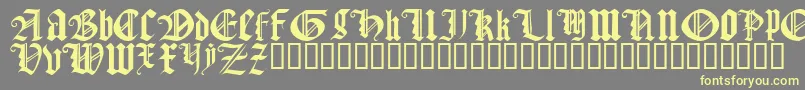 GothicTextureQuadrata-Schriftart – Gelbe Schriften auf grauem Hintergrund