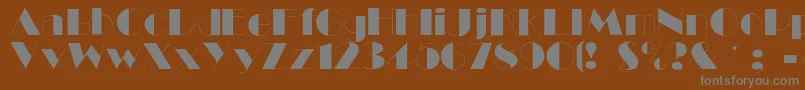 Więcej informacji o czcionce Ballet Czcionka Ballet – szare czcionki na brązowym tle