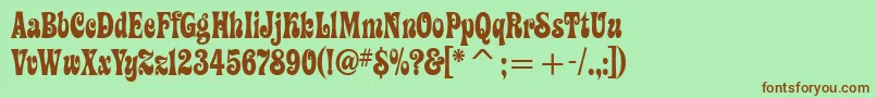 Artemon Font – Brown Fonts on Green Background