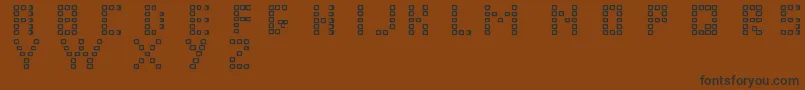 Pixel Chunker Font – Black Fonts on Brown Background