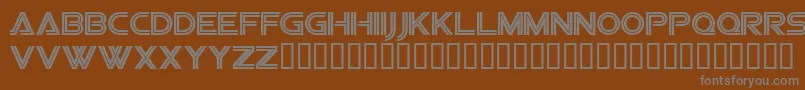 Sfvipersquadron-fontti – harmaat kirjasimet ruskealla taustalla