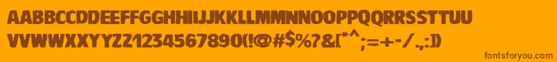 Czcionka VtcBaddrip – brązowe czcionki na pomarańczowym tle
