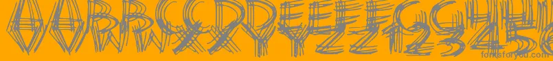 ScribbleLines-fontti – harmaat kirjasimet oranssilla taustalla