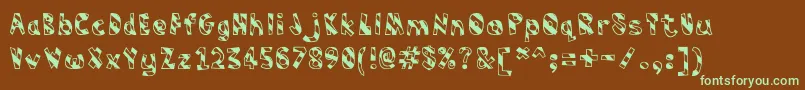 フォントHumbug – 緑色の文字が茶色の背景にあります。