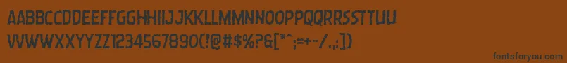 Шрифт Wormcuisine – чёрные шрифты на коричневом фоне