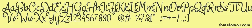Adelitha Font – Black Fonts on Yellow Background