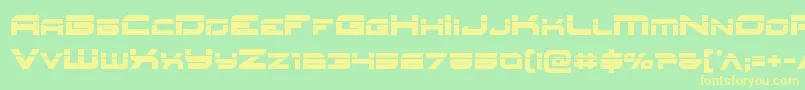 フォントRedrocketlaser – 黄色の文字が緑の背景にあります