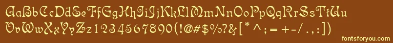 IsabellaDecor-fontti – keltaiset fontit ruskealla taustalla