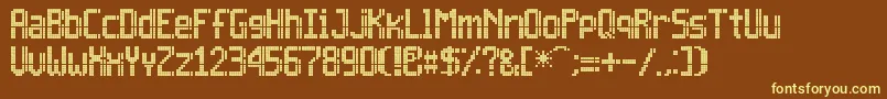 Inova13x7-fontti – keltaiset fontit ruskealla taustalla