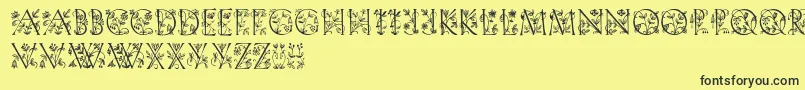 Gardendisplaycaps-fontti – mustat fontit keltaisella taustalla