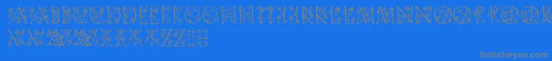 フォントGardendisplaycaps – 青い背景に灰色の文字