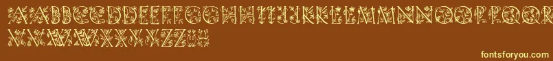 Gardendisplaycaps-fontti – keltaiset fontit ruskealla taustalla