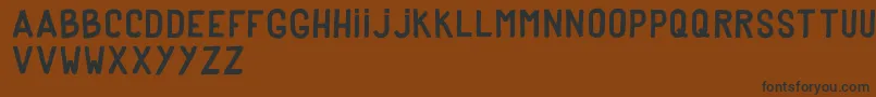 DkerPoster Font – Black Fonts on Brown Background